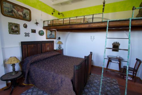 Postel nebo postele na pokoji v ubytování La Locanda del Barbablù
