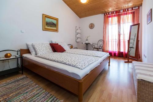 Ένα ή περισσότερα κρεβάτια σε δωμάτιο στο Apartments Faro & Mondo