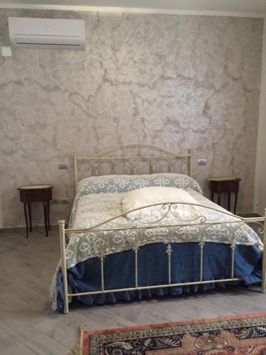 מיטה או מיטות בחדר ב-San Michele