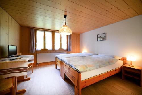 Postelja oz. postelje v sobi nastanitve Landgasthof Tännler