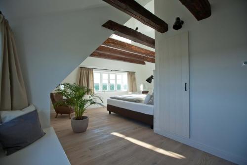 Un pat sau paturi într-o cameră la Tede Warft