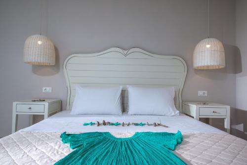 Katil atau katil-katil dalam bilik di Notos Heights Hotel & Suites