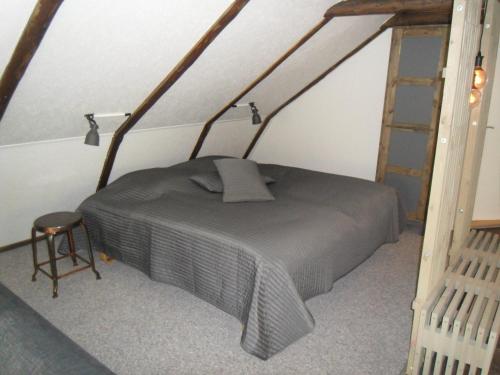 Postel nebo postele na pokoji v ubytování Lille Degnbøl