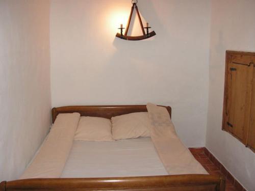 Кровать или кровати в номере Ven Eperfa Vendeghaz