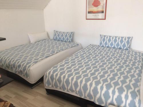 Postel nebo postele na pokoji v ubytování Apartment Adam