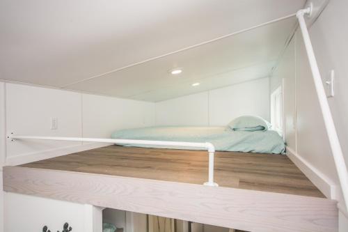 Postel nebo postele na pokoji v ubytování Tiny House Siesta