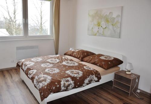 Postel nebo postele na pokoji v ubytování Apartmán Vanessa