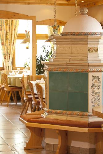a stack of books on a table in a restaurant at Landgasthof Paradies in Frickingen