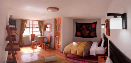 TV a/nebo společenská místnost v ubytování Hotel Inka King