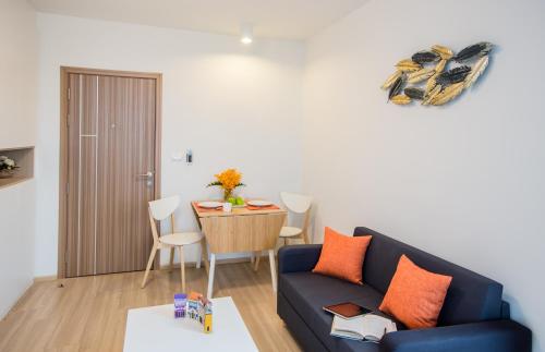 Χώρος καθιστικού στο Connext Residence Phuket