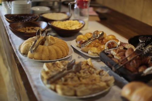 a buffet with many different types of food on a table at Shoestring Cave House in Goreme