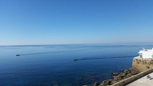 a view of the ocean from a lighthouse at B&B Punta Cutieri in Gallipoli
