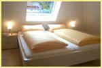 Łóżko lub łóżka w pokoju w obiekcie Haus Sonja