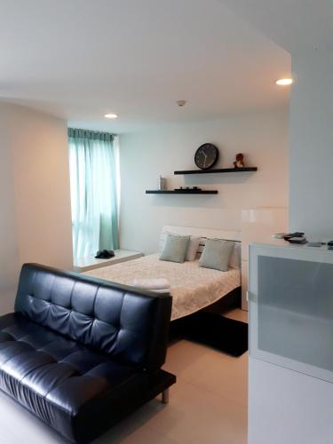 Llit o llits en una habitació de Acqua Apartment