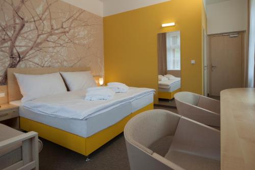 Postel nebo postele na pokoji v ubytování Hotel Terra