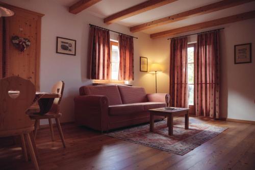 Area soggiorno di Pineta Natural Chalet