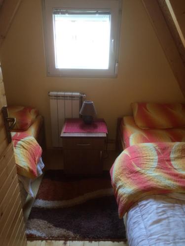 Postel nebo postele na pokoji v ubytování Apartment MG