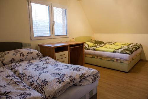 A bed or beds in a room at Relax na Morave
