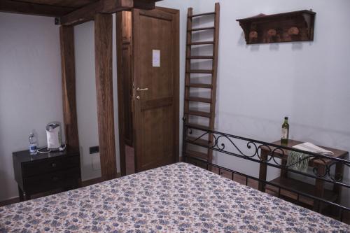 Ένα ή περισσότερα κρεβάτια σε δωμάτιο στο Angolo del Gelsomino