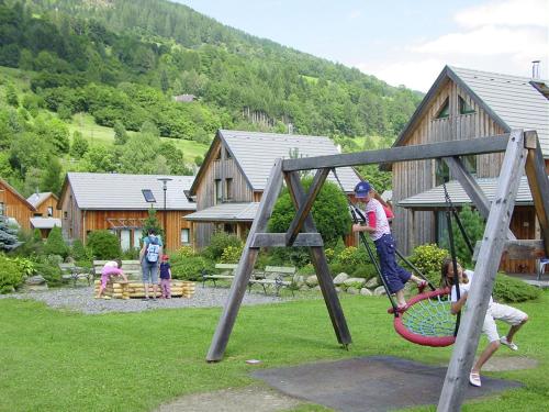 Area giochi per bambini di Modern Holiday Home in Sankt Georgen with Swimming Pool