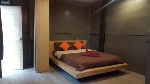 Postel nebo postele na pokoji v ubytování I-Talay Loft
