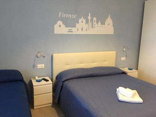 Ένα ή περισσότερα κρεβάτια σε δωμάτιο στο A Casa di Sara 2