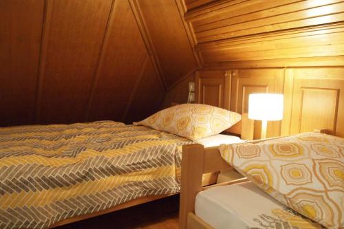 Postel nebo postele na pokoji v ubytování Apartman Krolo