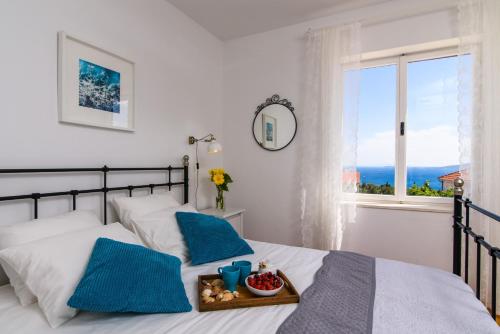 Posteľ alebo postele v izbe v ubytovaní Holiday home Trogir flower