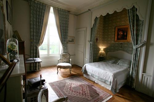 Voodi või voodid majutusasutuse Château de Beaujeu toas