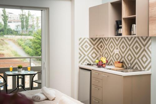 Η κουζίνα ή μικρή κουζίνα στο IRINI STALOS Apartments