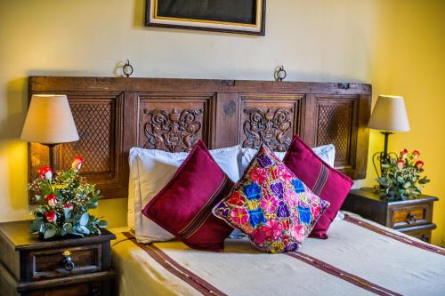 Ένα ή περισσότερα κρεβάτια σε δωμάτιο στο Hotel Convento Santa Catalina by AHS