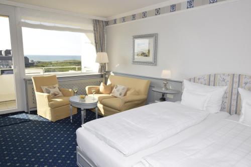 Postel nebo postele na pokoji v ubytování Hotel Wiking Sylt