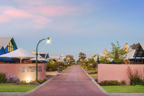 a walkway at the end of a street at Dunsborough Beach Cottages in Dunsborough
