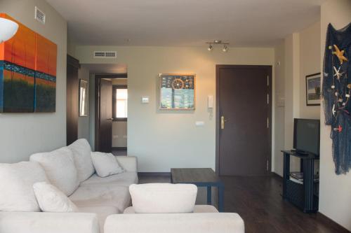 Ruang duduk di Costabravaforrent Residencial Albons
