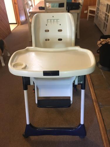 a high chair sitting on a table at The Retreat on Matthew in Batehaven