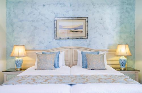 Ένα ή περισσότερα κρεβάτια σε δωμάτιο στο El Oceano Beach Hotel Adults only recommended