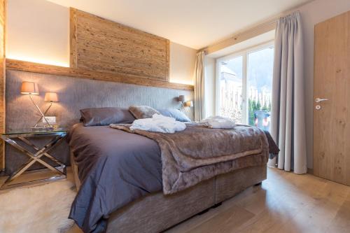 Кровать или кровати в номере Chalet O New!