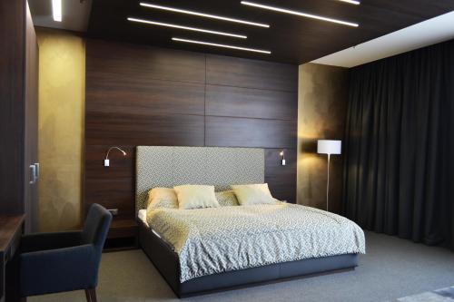 Postel nebo postele na pokoji v ubytování Hotel Arena