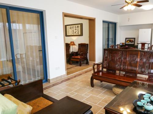 Posezení v ubytování Huizhou Double Moon Zen Service Apartment