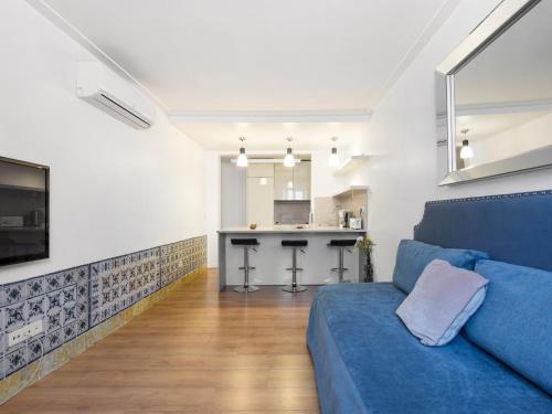 a living room with a couch and a coffee table at Lisbon Serviced Apartments - Baixa in Lisbon
