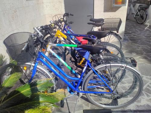 a group of bikes parked next to each other at Hotel Orchidea in Bardolino