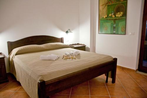 Ένα ή περισσότερα κρεβάτια σε δωμάτιο στο Casale Il Gheppio