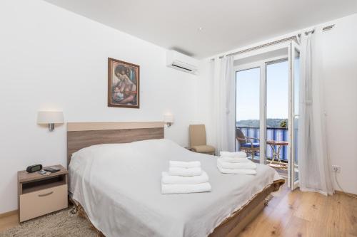 Posteľ alebo postele v izbe v ubytovaní NORA APARTMENT by DuHomes