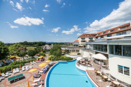 an aerial view of a resort with a swimming pool at Hotel Reiters Finest Family in Bad Tatzmannsdorf