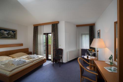 Postel nebo postele na pokoji v ubytování Hotel Vogtland