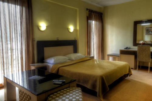 Postel nebo postele na pokoji v ubytování Hotel Hamam