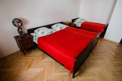 Postel nebo postele na pokoji v ubytování Dima's Guesthouse