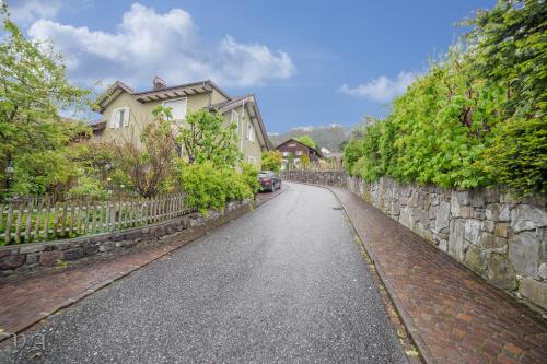 an empty street in front of a house at Ferienwohnung für zwei Personen mit Küche in Triesen