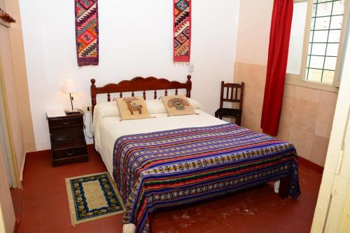Posteľ alebo postele v izbe v ubytovaní Hostal Yatasto