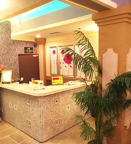 a lobby with a reception counter in a hotel at SARI Resort Kawanishi (Adult Only) in Kawanishi